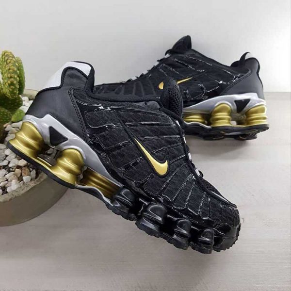 nike shox negro con dorado