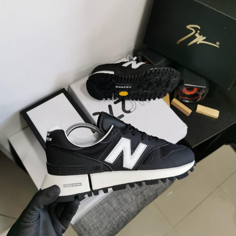 New balance negras para niños sale